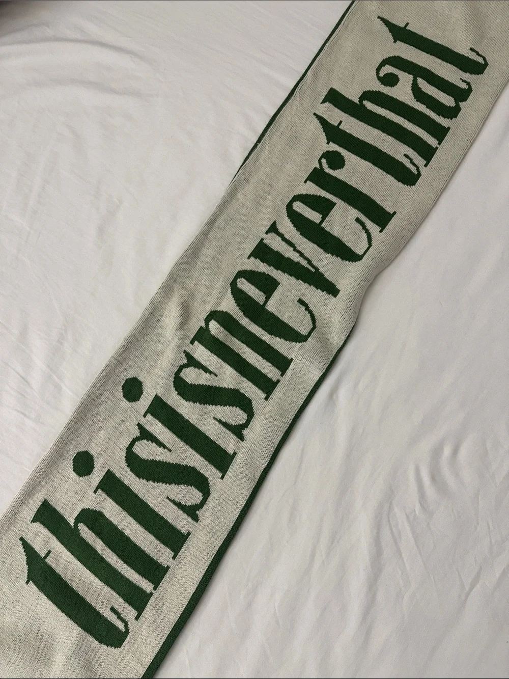 This is never that green beige scarf
